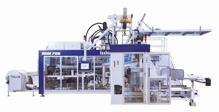 Ein typischer Rollenformautomat mit IML-Einheit. Darauf können die neuen »IML-T Cardboard«-Anwendungen gefertigt werden. Bild: Illig